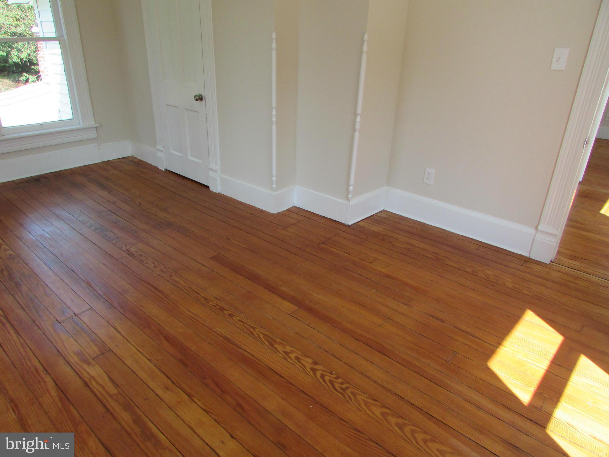 9520 Main Street Manassas, VA 20110 - Photo 15 of 19 wooden floor in an empty room