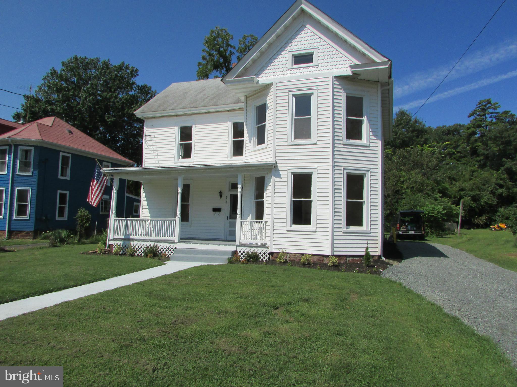 9520 Main Street Manassas, VA 20110 - Photo 19 of 19 a front view of a house with a yard