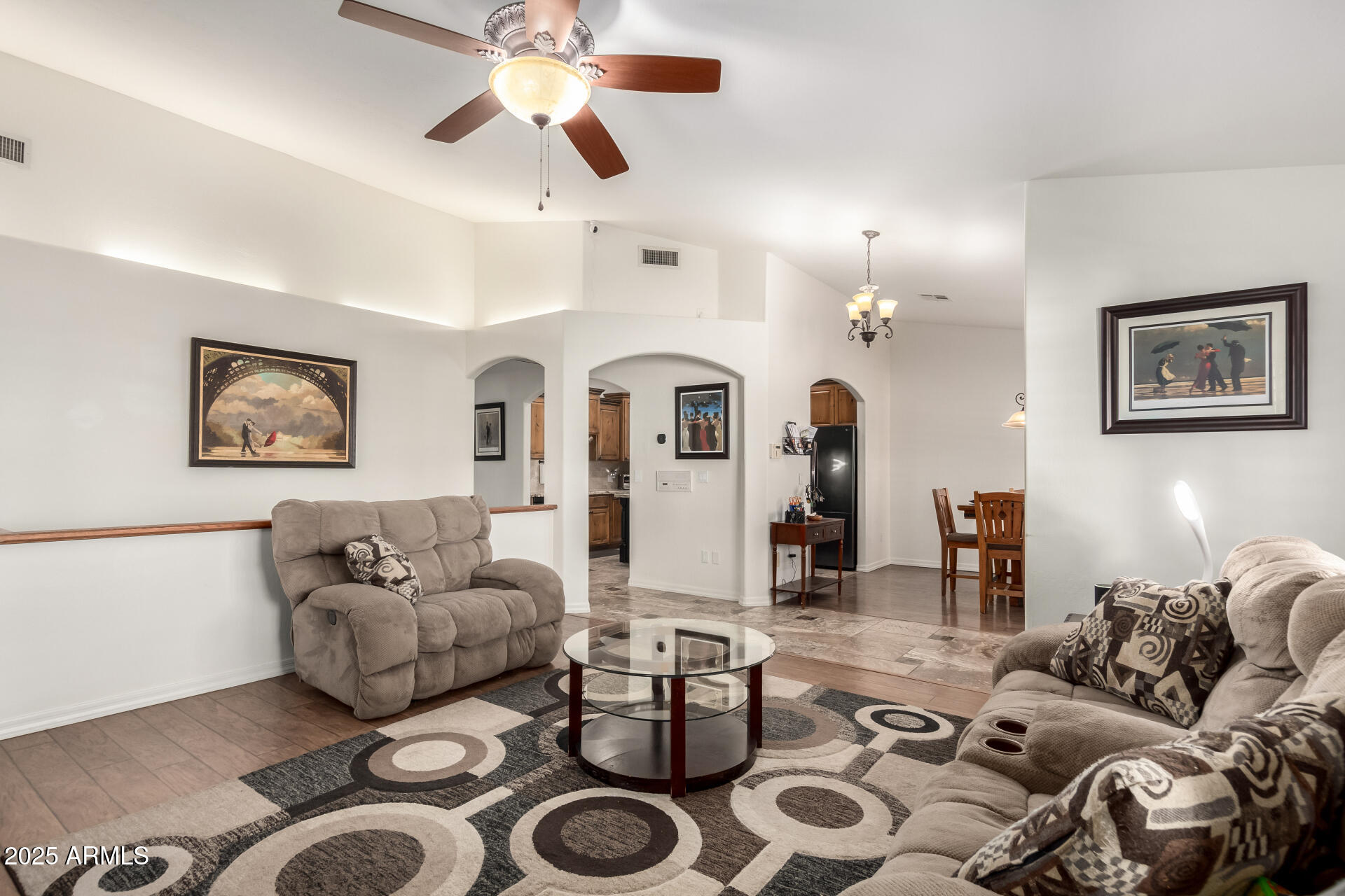 17645 East Stacey Road Queen Creek, AZ 85142 - Photo 12 of 109 a living room with furniture and a chandelier