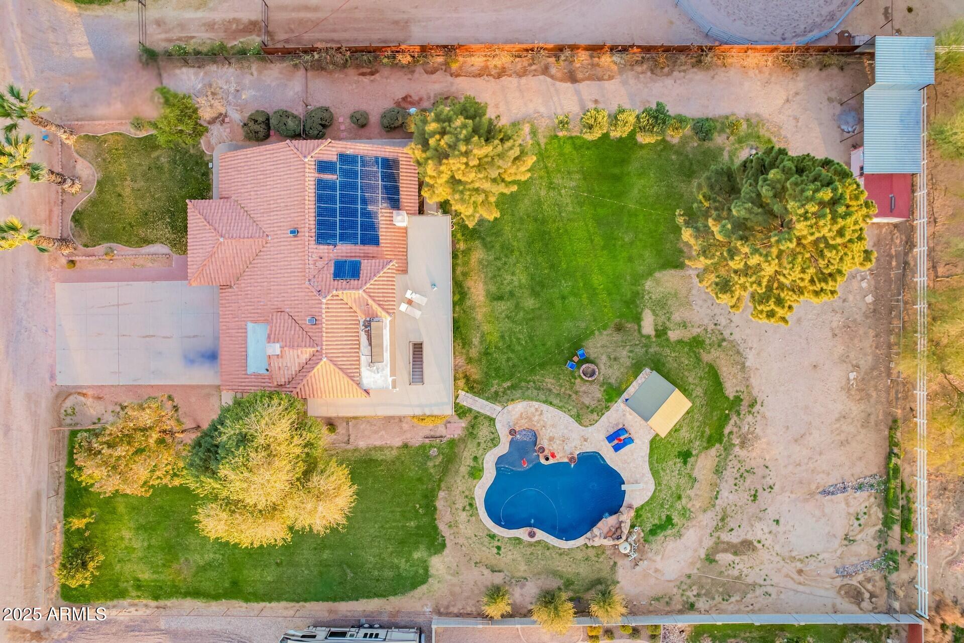 17645 East Stacey Road Queen Creek, AZ 85142 - Photo 2 of 109 a aerial view of a house with a yard and garden