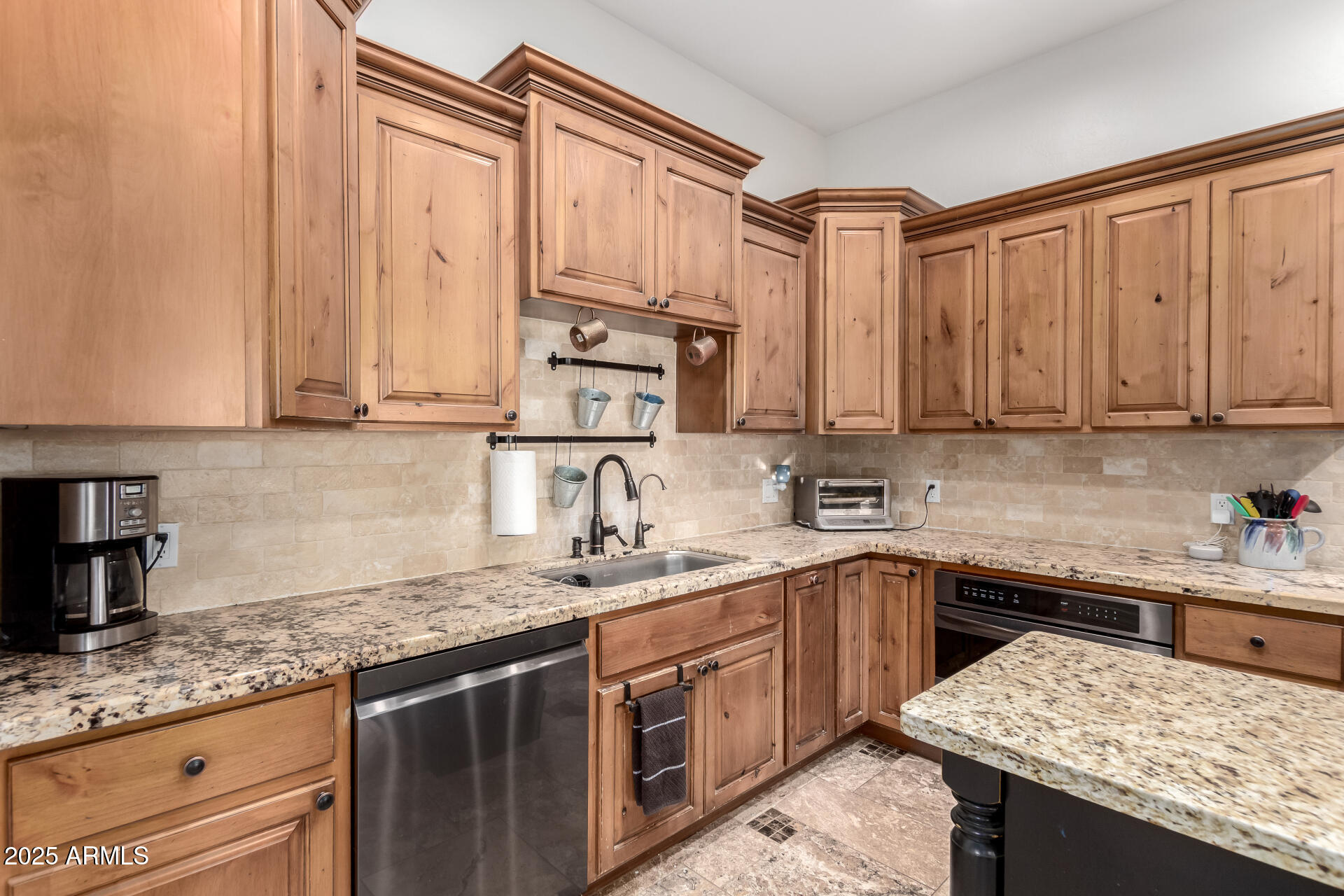 17645 East Stacey Road Queen Creek, AZ 85142 - Photo 23 of 109 a kitchen with stainless steel appliances granite countertop a sink stove and cabinets