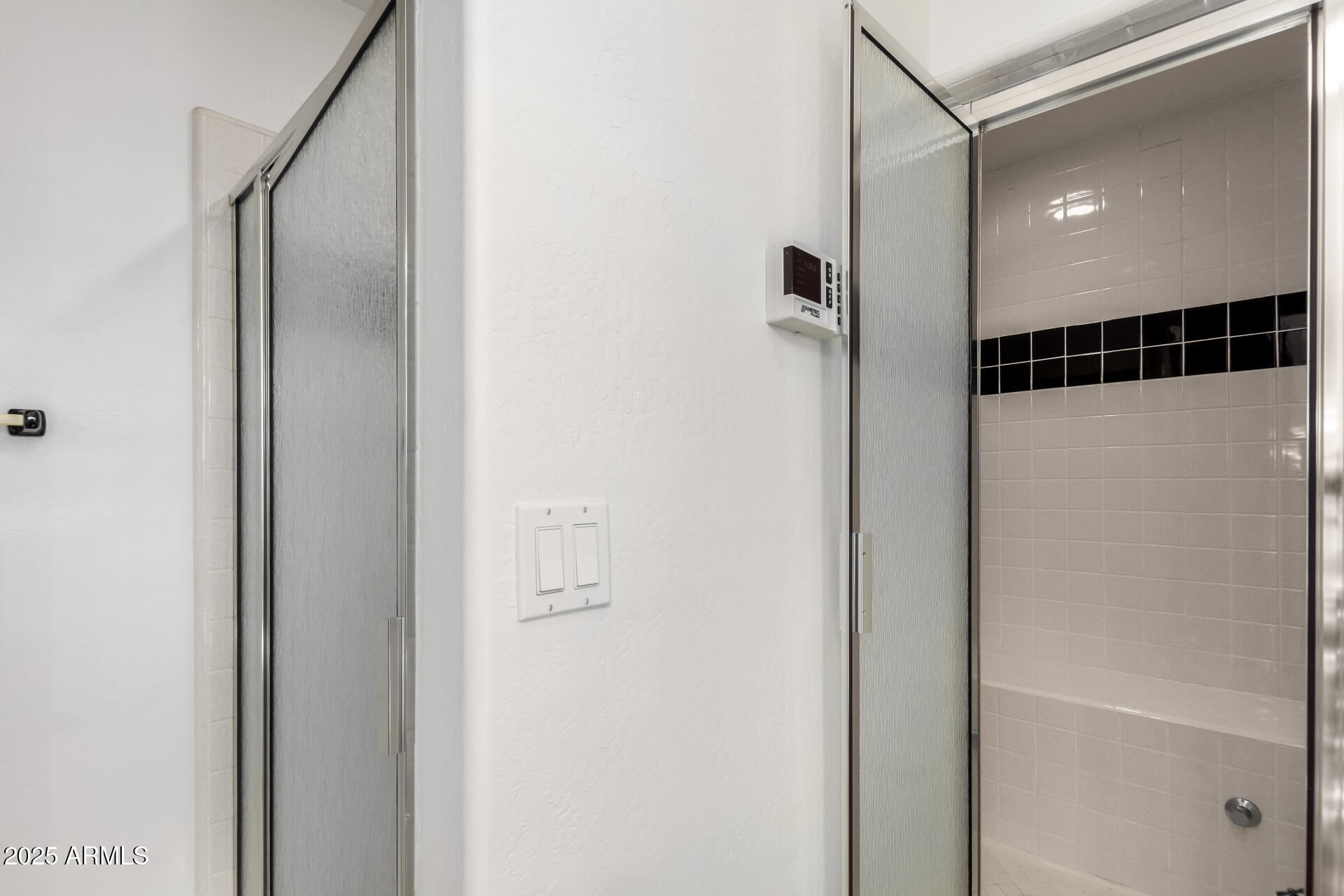 17645 East Stacey Road Queen Creek, AZ 85142 - Photo 44 of 109 a bathroom with a shower and a glass door