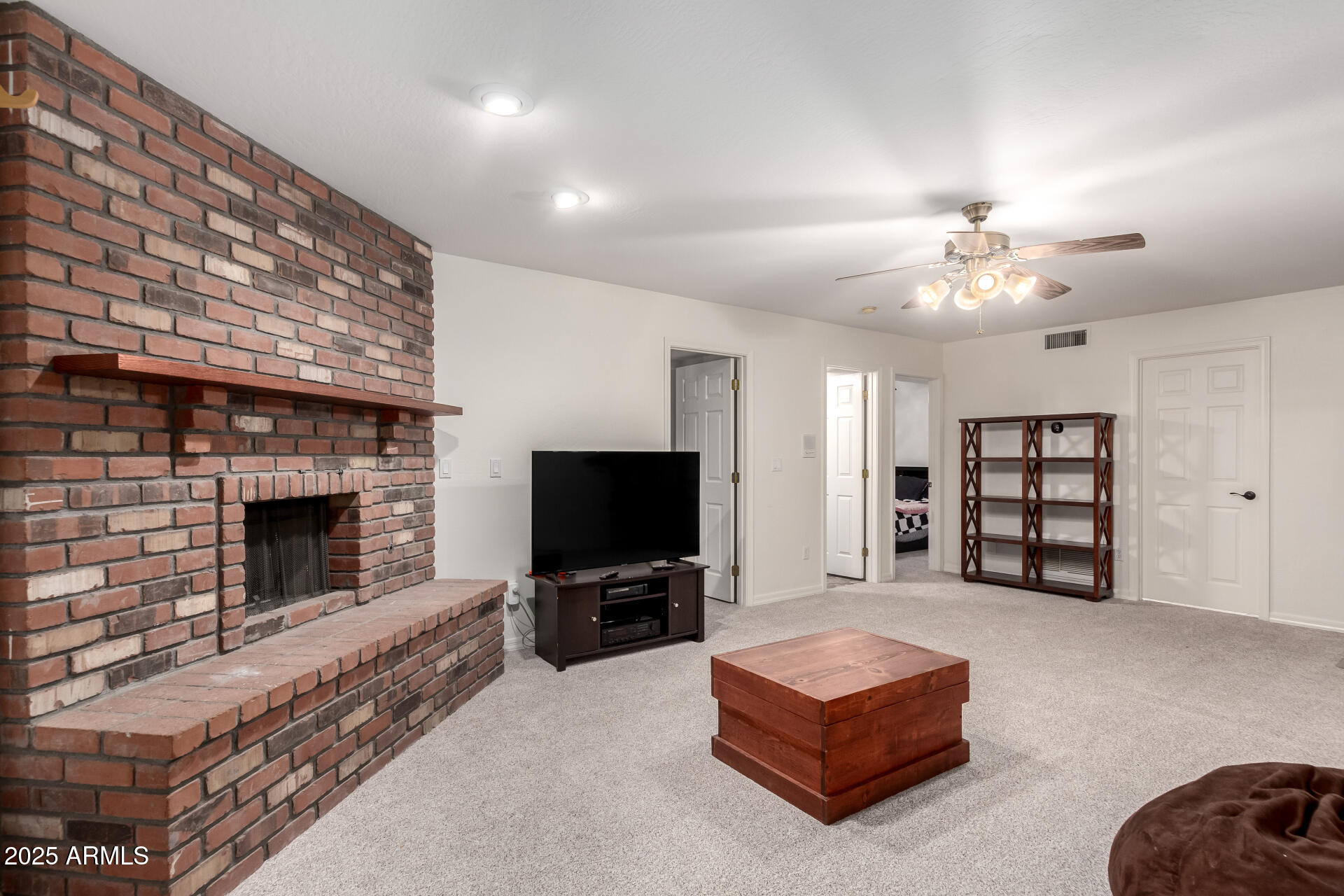 17645 East Stacey Road Queen Creek, AZ 85142 - Photo 47 of 109 a living room with furniture and a fireplace