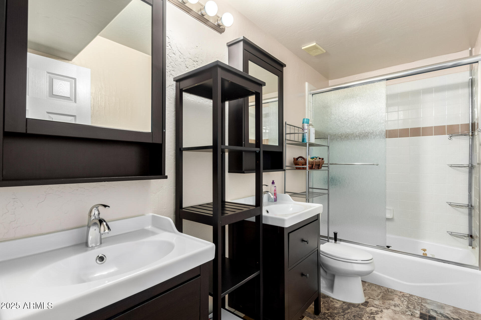 17645 East Stacey Road Queen Creek, AZ 85142 - Photo 49 of 109 a bathroom with a sink a toilet and shower