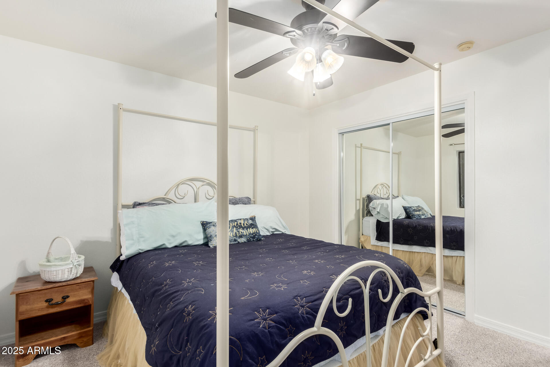 17645 East Stacey Road Queen Creek, AZ 85142 - Photo 51 of 109 a bedroom with a bed and ceiling fan