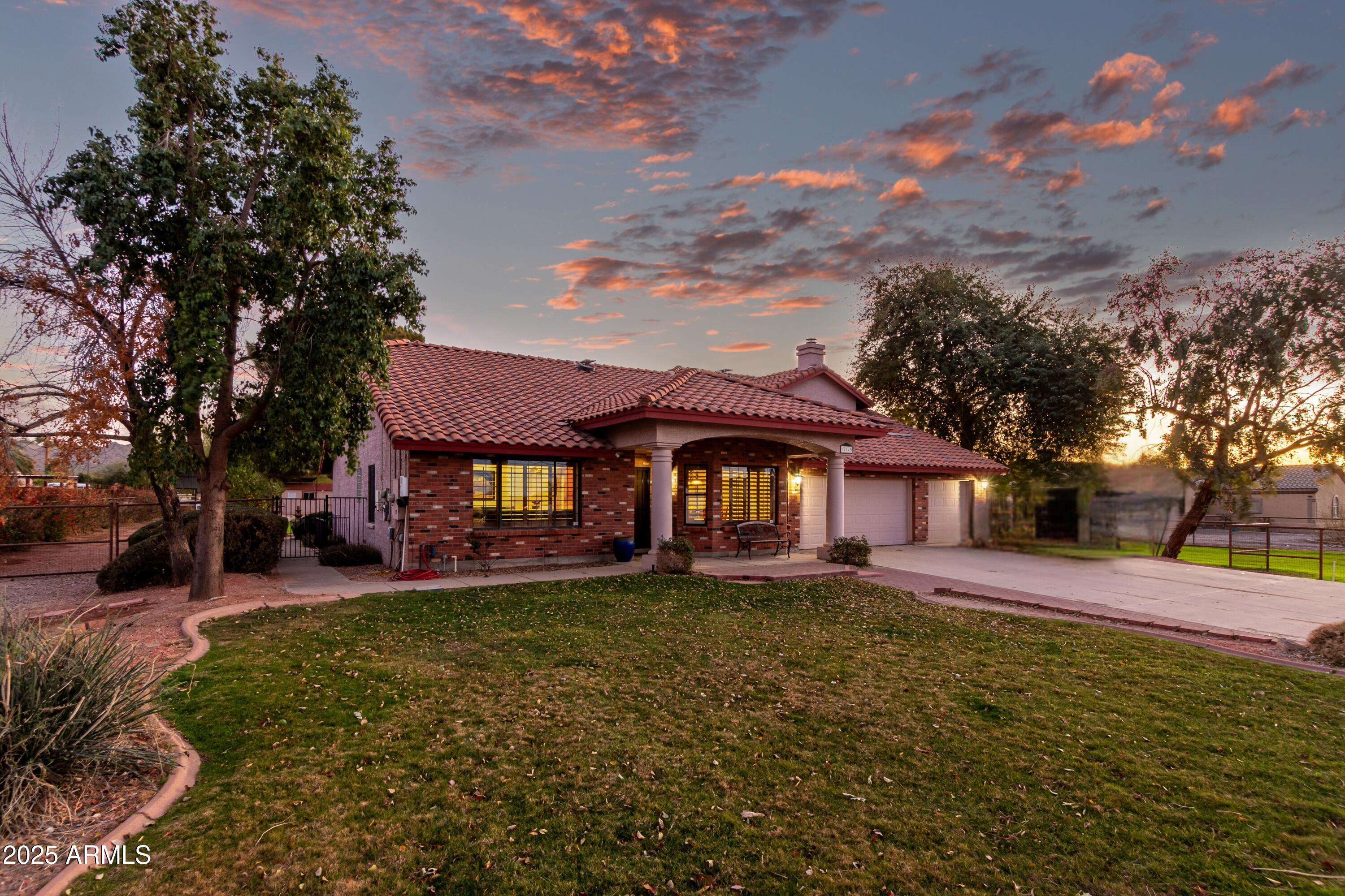 17645 East Stacey Road Queen Creek, AZ 85142 - Photo 6 of 109 front view of a house with a yard