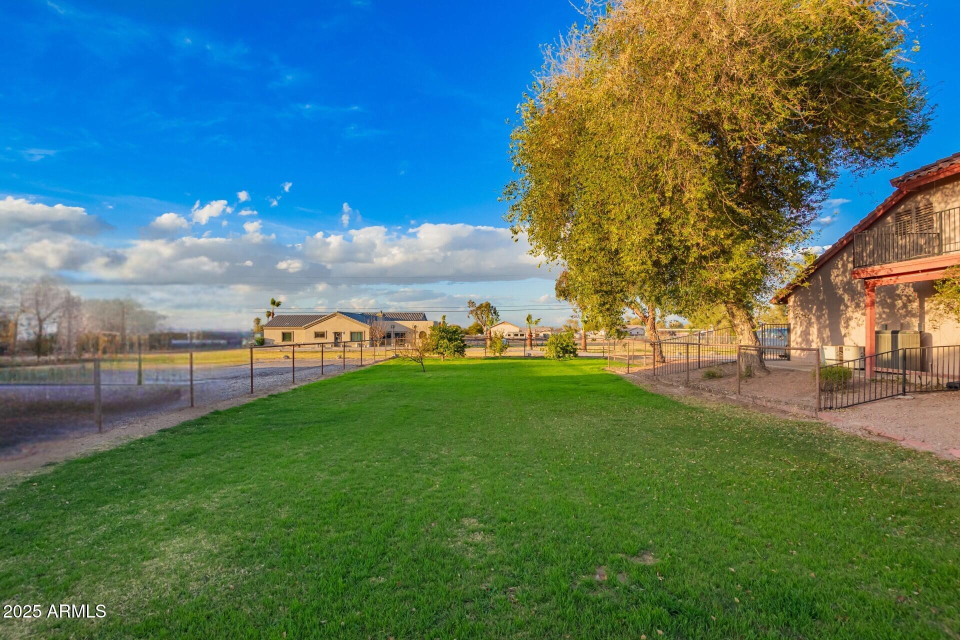 17645 East Stacey Road Queen Creek, AZ 85142 - Photo 75 of 109 a view of yard with swimming pool and green space