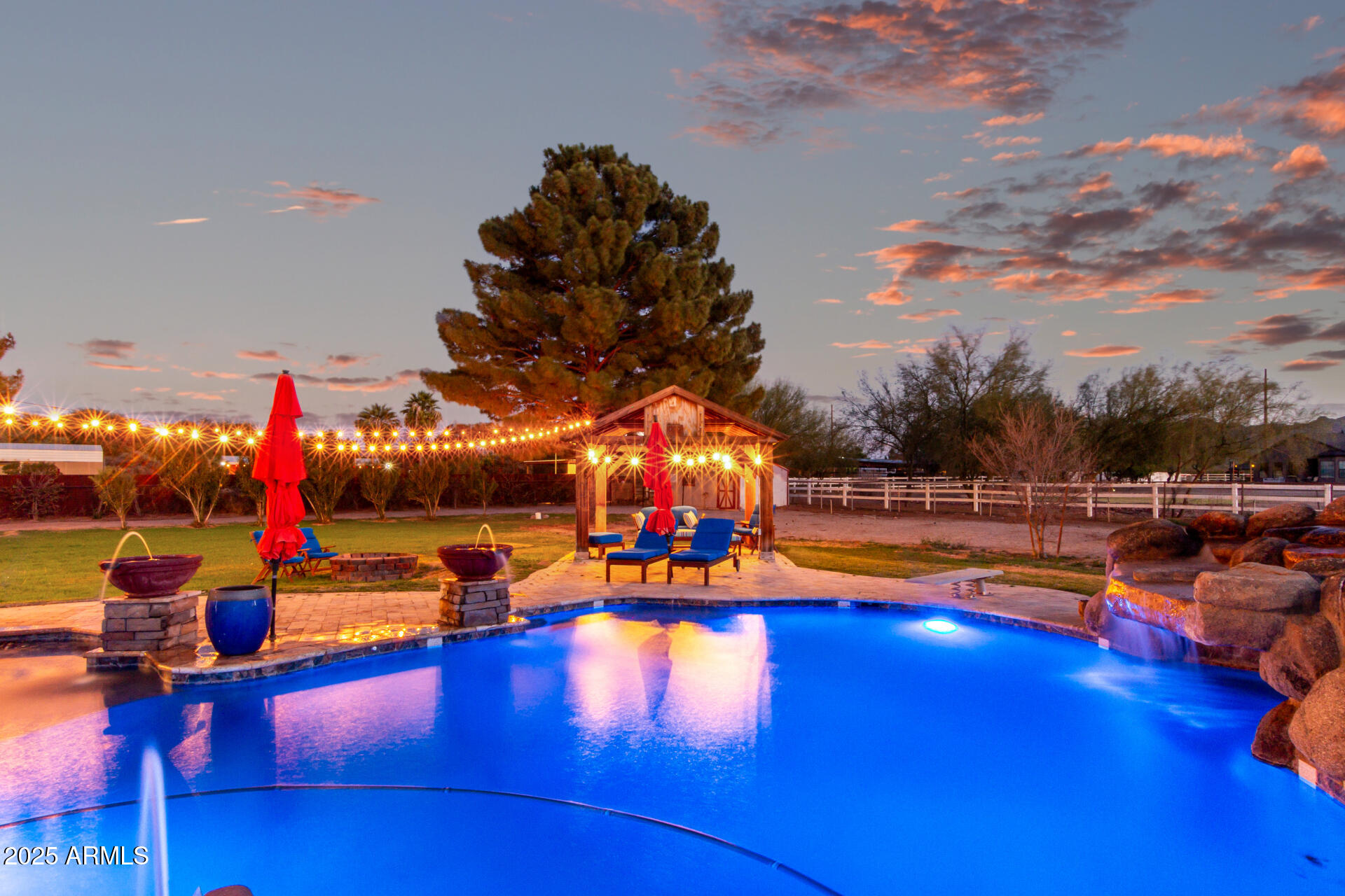 17645 East Stacey Road Queen Creek, AZ 85142 - Photo 80 of 109 a view of a swimming pool with sitting area
