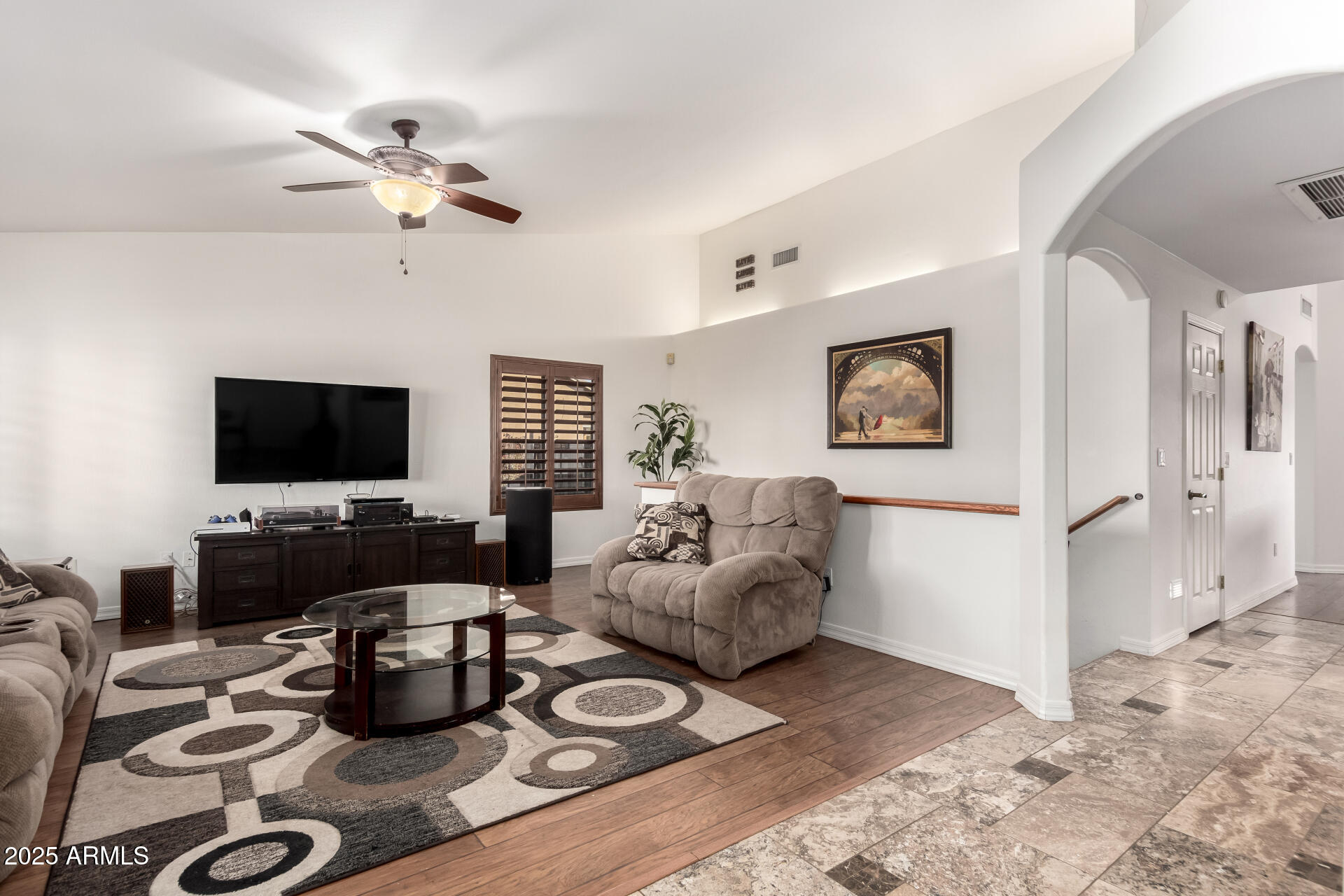 17645 East Stacey Road Queen Creek, AZ 85142 - Photo 8 of 109 a living room with furniture and a flat screen tv