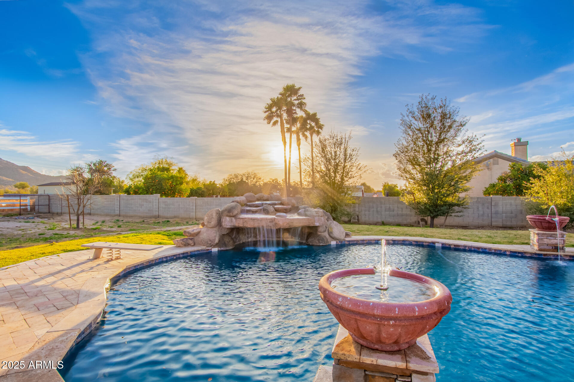 17645 East Stacey Road Queen Creek, AZ 85142 - Photo 82 of 109 a view of a swimming pool with a lounge chairs