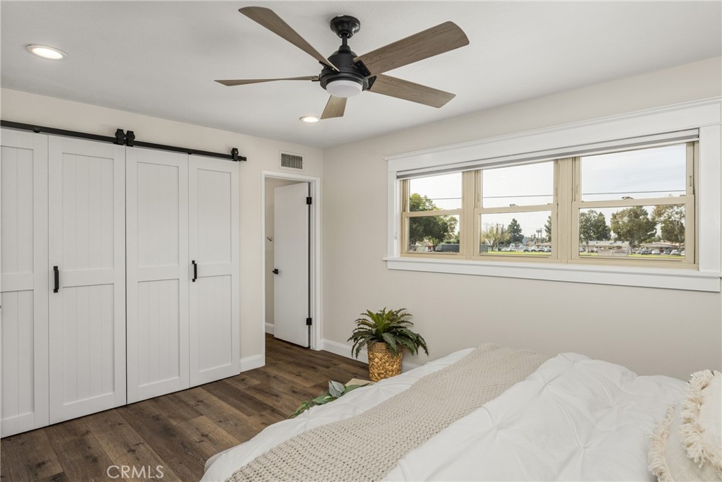 1440 North Harding Street Orange, CA 92867 - Photo 21 of 38 a bedroom with a large bed and a window