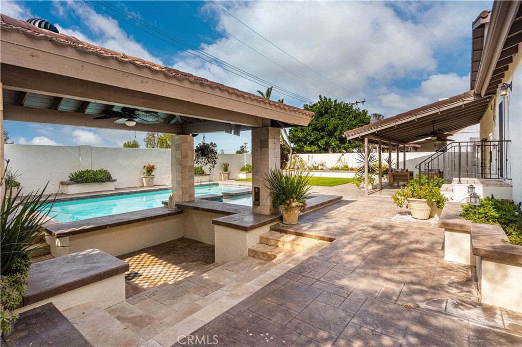 1440 North Harding Street Orange, CA 92867 - Photo 34 of 38 a view of swimming pool with outdoor seating and a potted plant