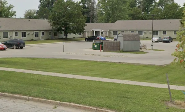 a view of a house with a back yard