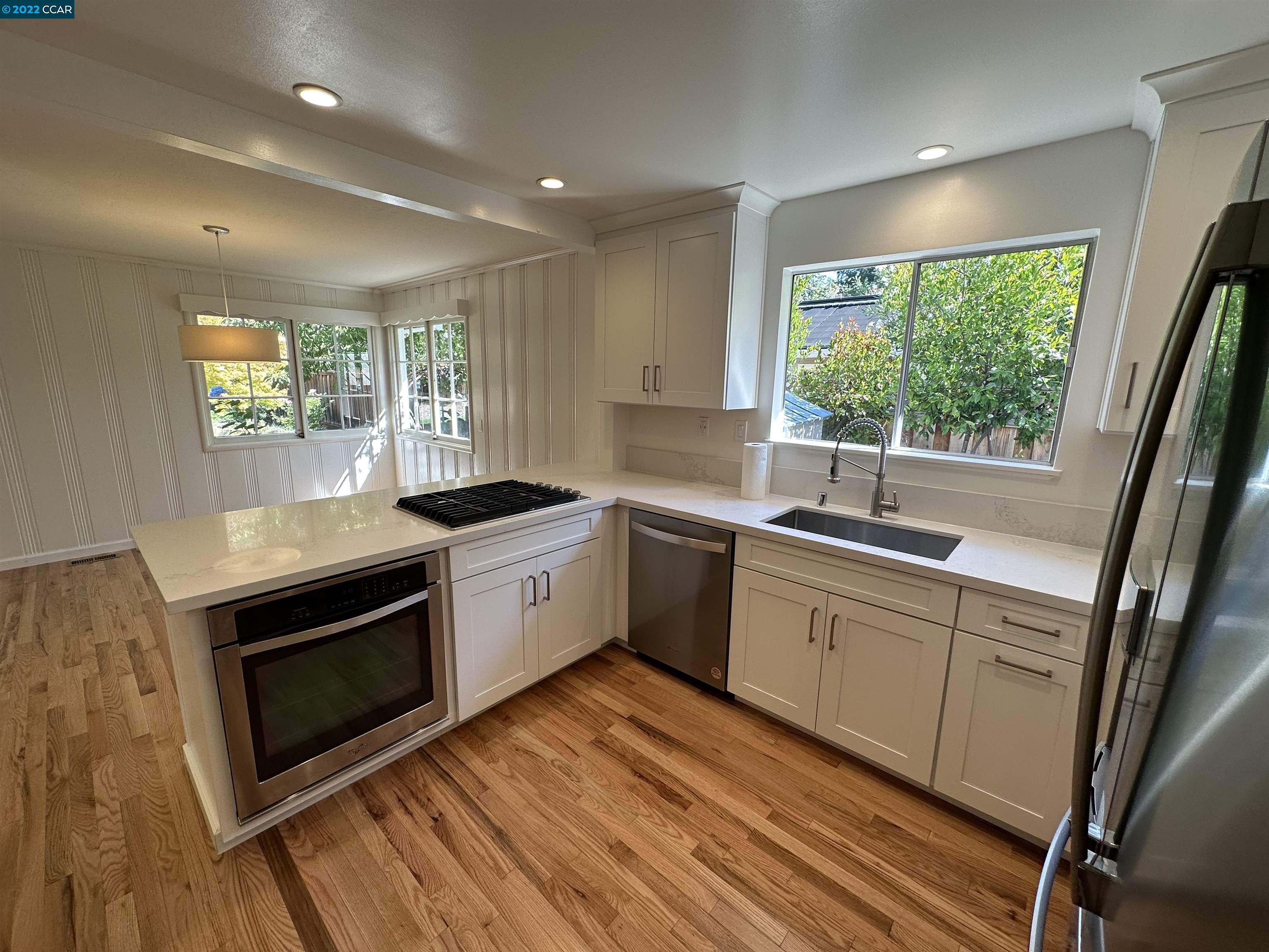 3360 Victoria Avenue Lafayette, CA 94549 - Photo 19 of 20 a kitchen that has a sink and a stove top oven