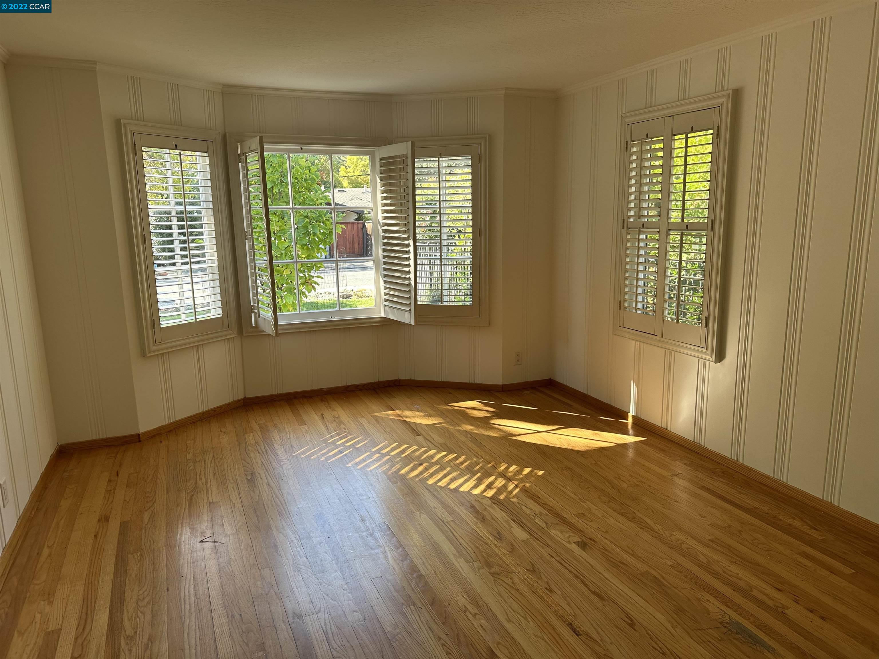 3360 Victoria Avenue Lafayette, CA 94549 - Photo 5 of 20 a view of empty room with wooden floor and fan