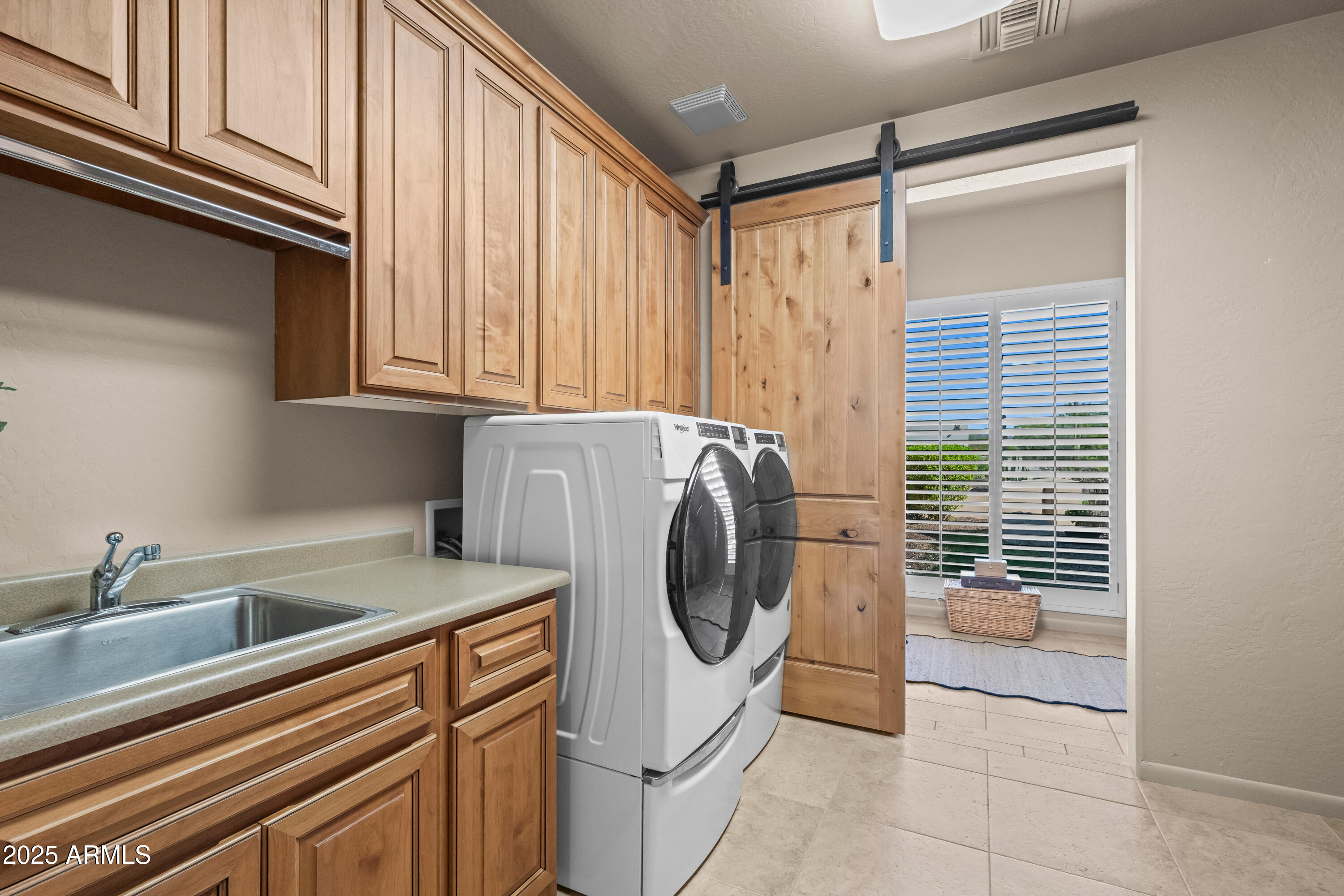 19007 East Lazo Court Rio Verde, AZ 85263 - Photo 23 of 58 a utility room with sink dryer and washer