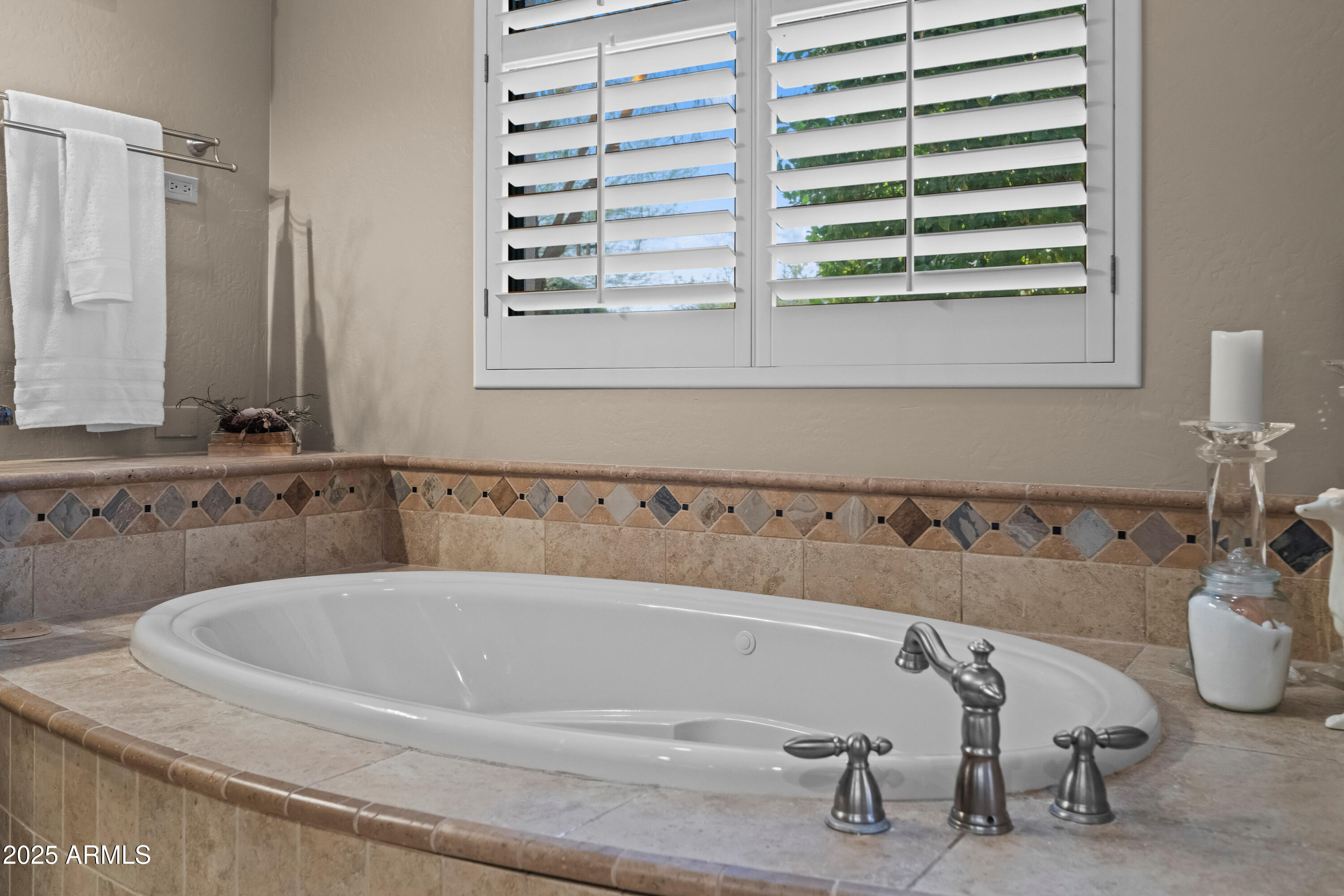 19007 East Lazo Court Rio Verde, AZ 85263 - Photo 27 of 58 a bathroom with a bathtub and a sink