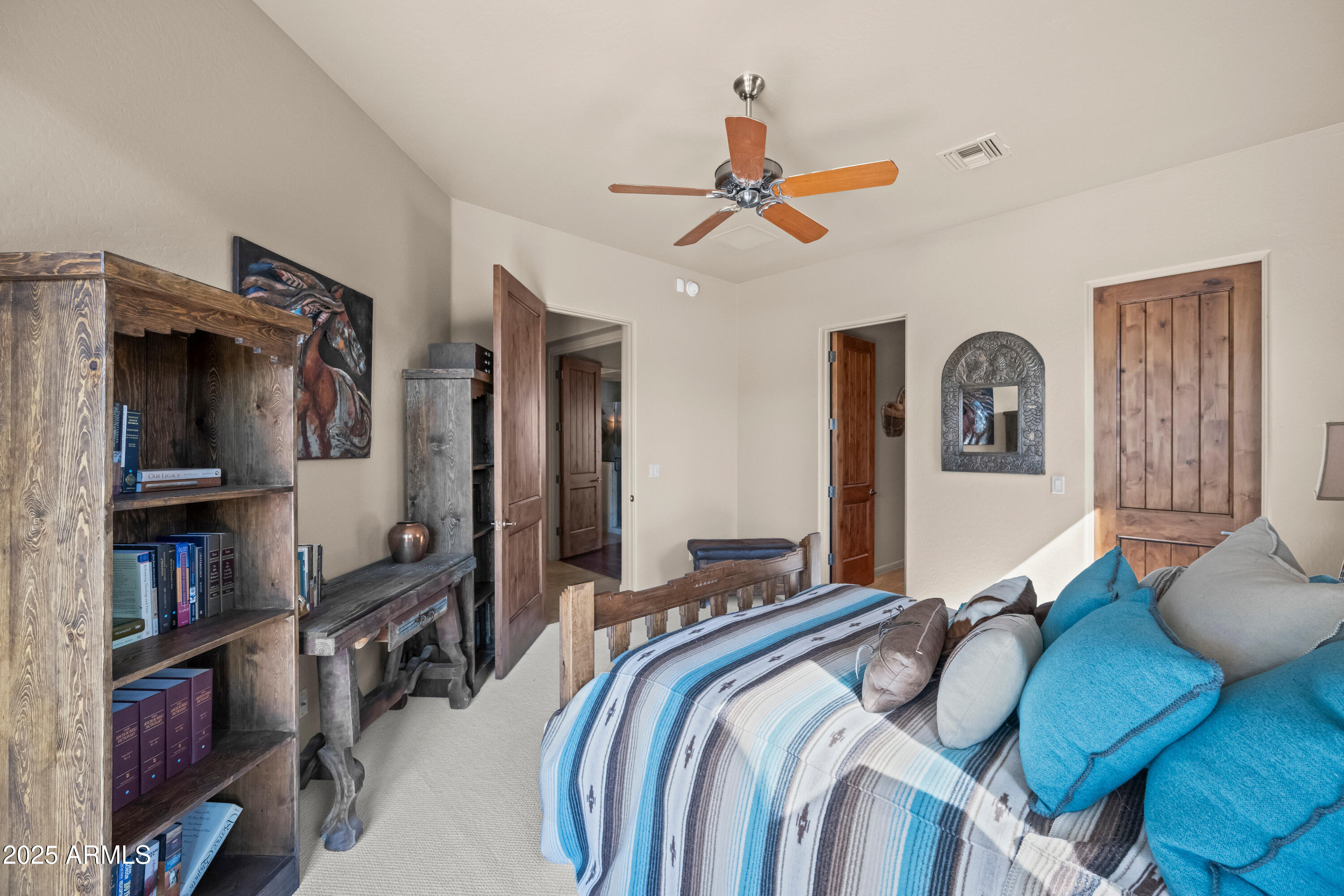 19007 East Lazo Court Rio Verde, AZ 85263 - Photo 35 of 58 a bedroom with a bed dresser and a window