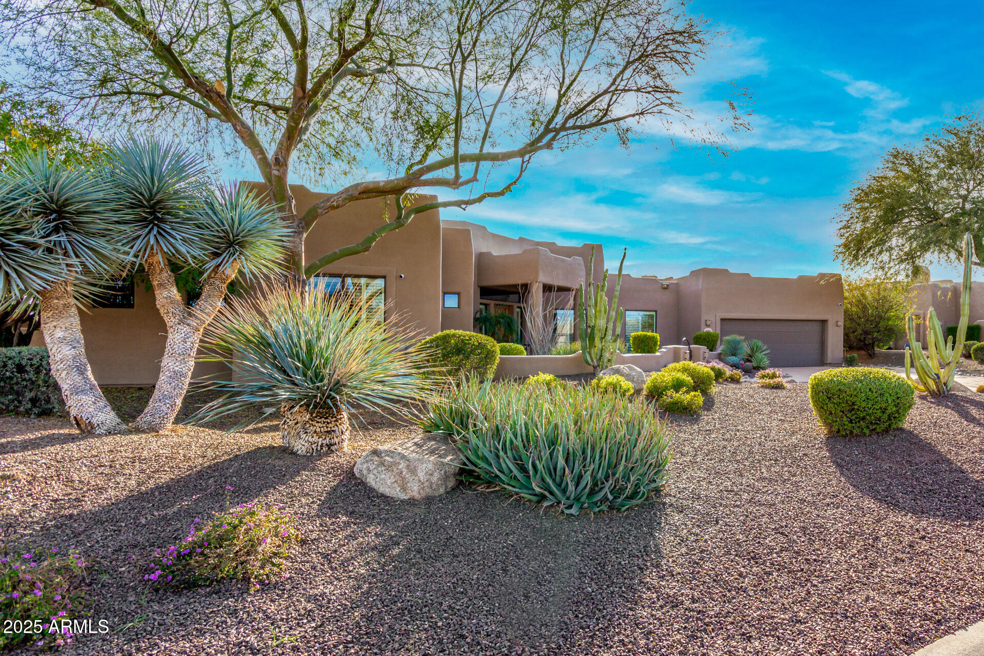 19007 East Lazo Court Rio Verde, AZ 85263 - Photo 5 of 58 a view of a house with backyard and trees