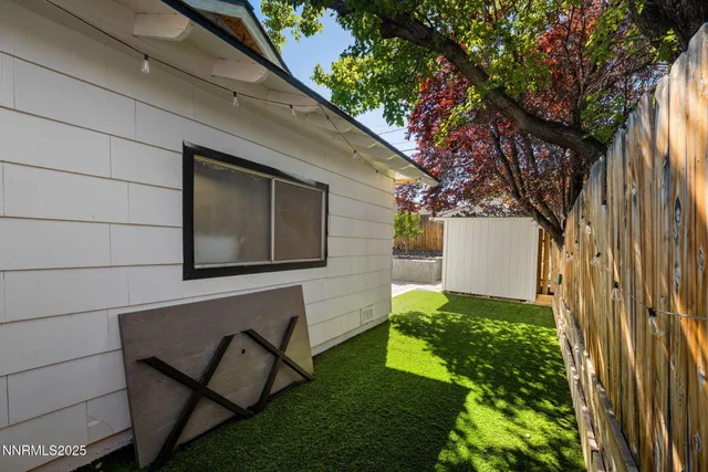 a backyard of a house with lots of green space
