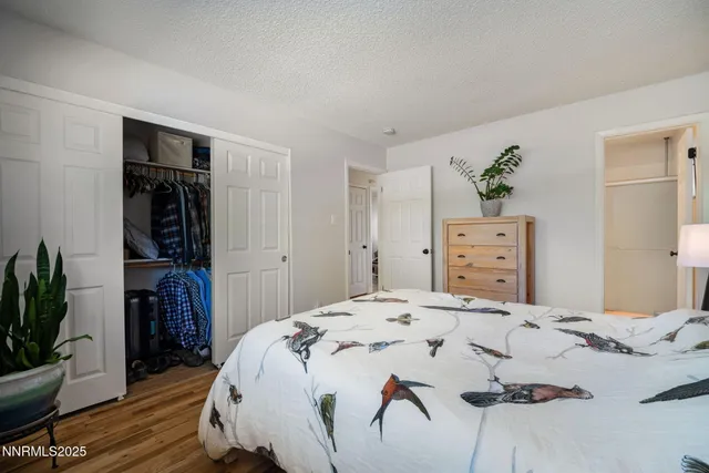 a bathroom with a sink toilet a mirror and shower
