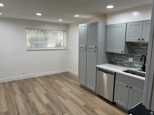 6884 670 East Midvale, UT 84047 - Photo 5 of 28 Kitchen with gray cabinetry, light wood finished floors, dishwasher, backsplash, and recessed lighting