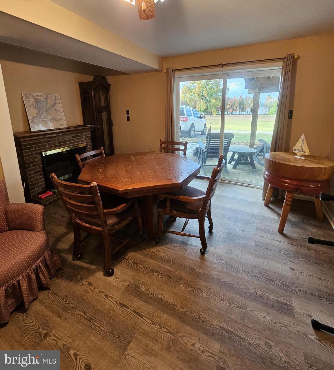82 Basin Road Earleville, MD 21919 - Photo 11 of 46 a living room with furniture a bed and a large window
