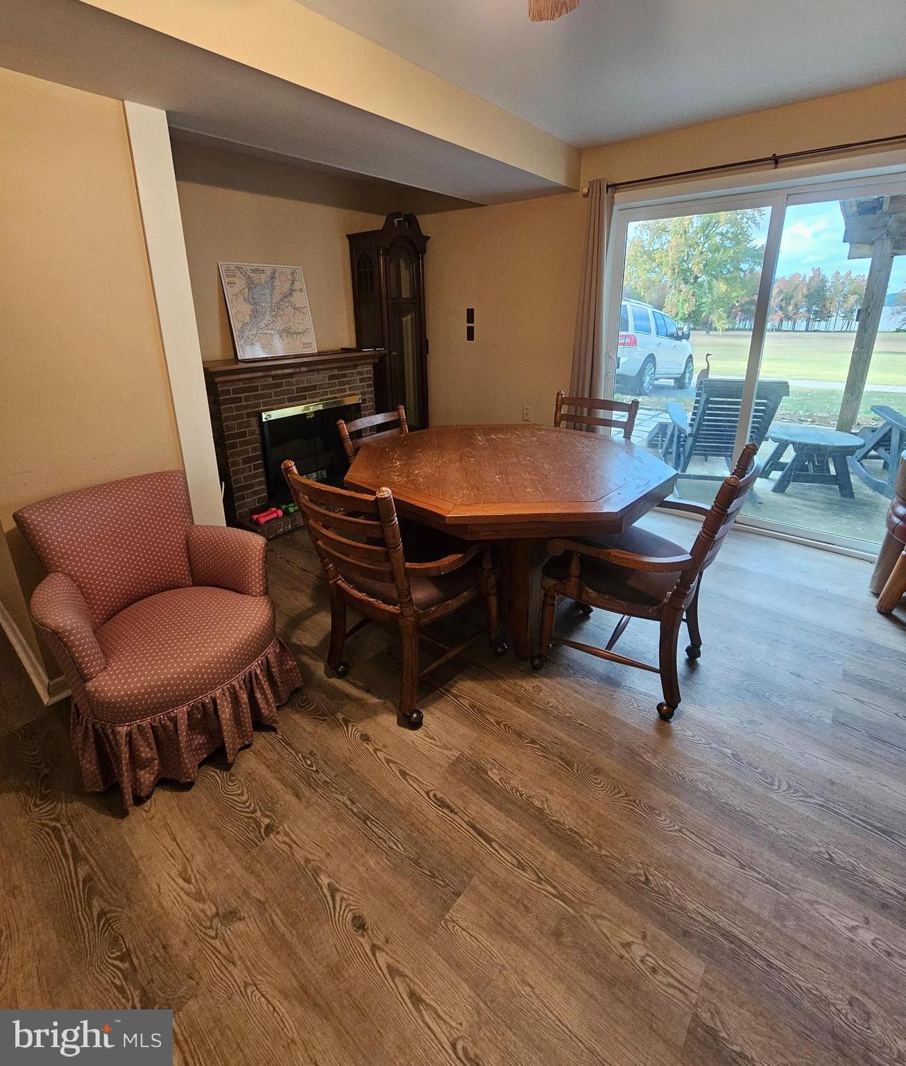 82 Basin Road Earleville, MD 21919 - Photo 12 of 46 a living room with furniture a large window and a table