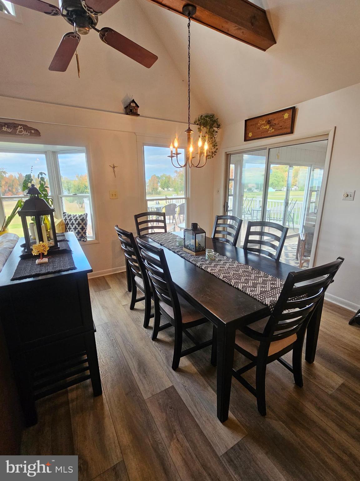 82 Basin Road Earleville, MD 21919 - Photo 22 of 46 a view of a dining room with furniture and wooden floor