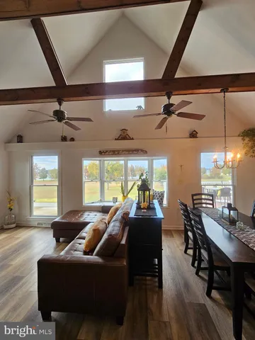 a living room with furniture and a table