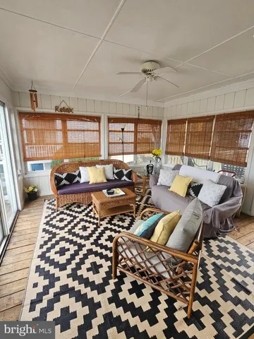 a view of a terrace with furniture