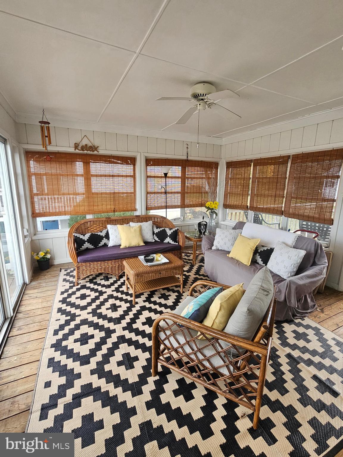 82 Basin Road Earleville, MD 21919 - Photo 27 of 46 a living room with furniture and a flat screen tv