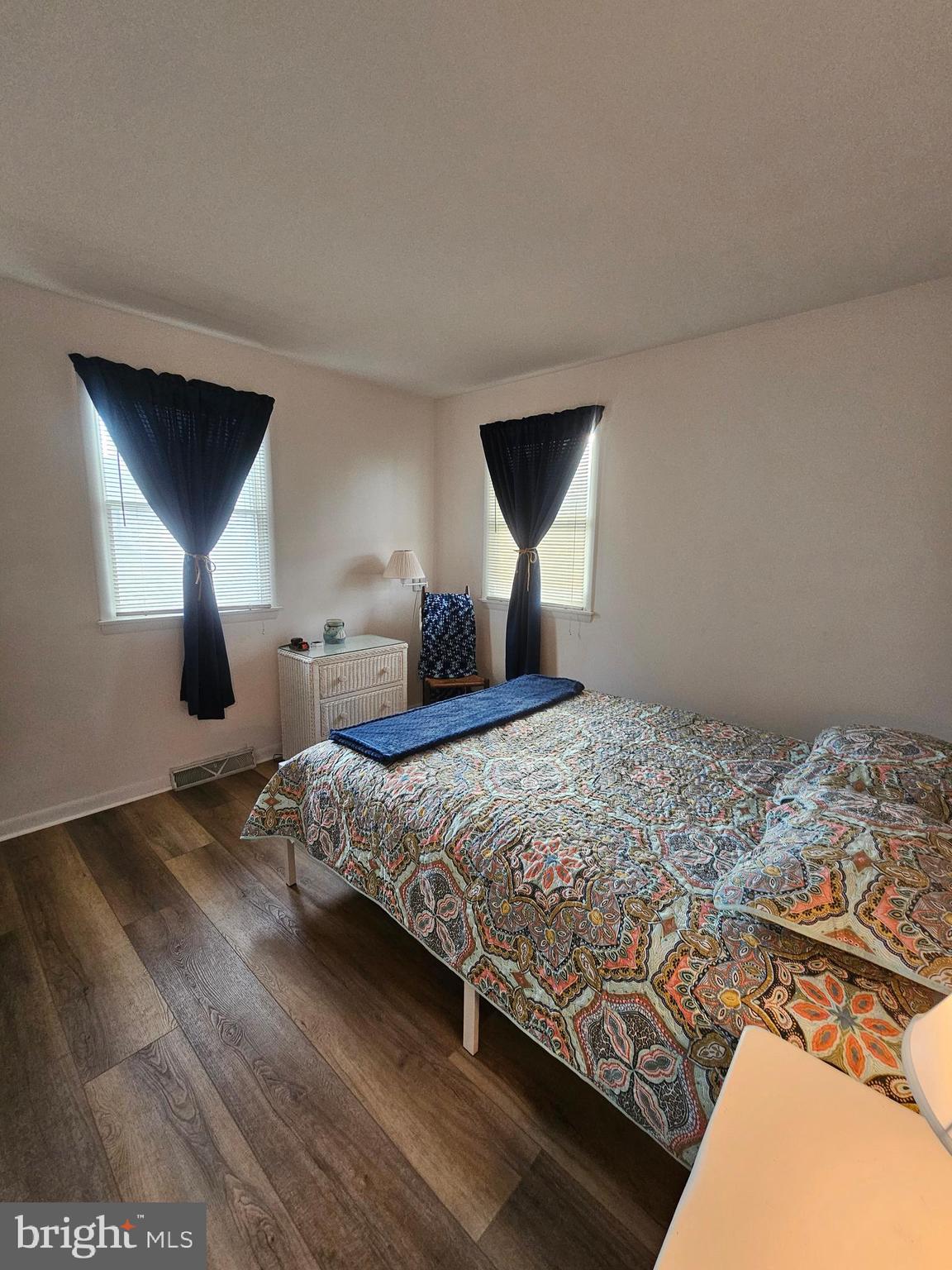 82 Basin Road Earleville, MD 21919 - Photo 31 of 46 a bedroom with a bed and a night stand