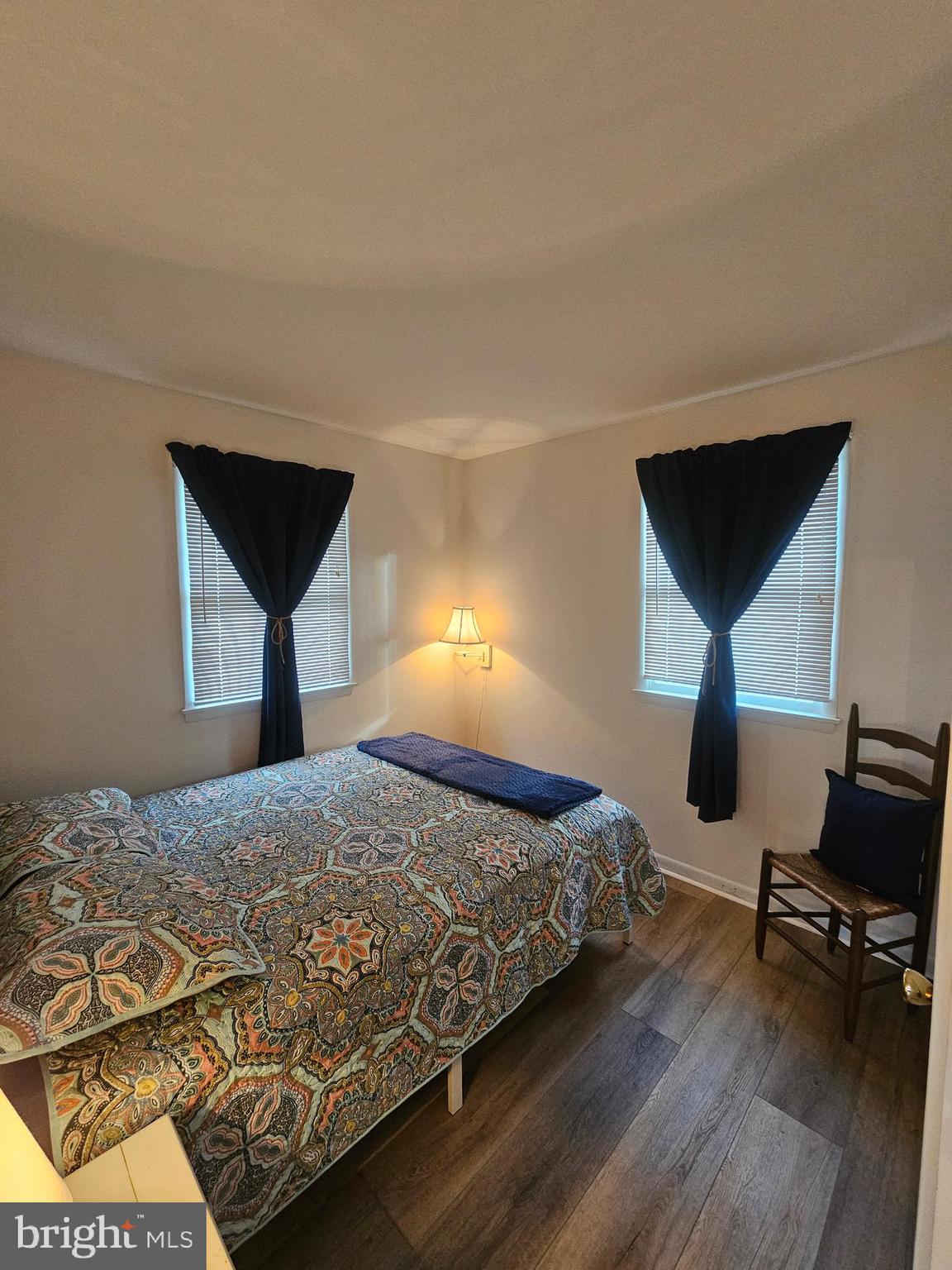 82 Basin Road Earleville, MD 21919 - Photo 35 of 46 a bedroom with a bed a desk and chair