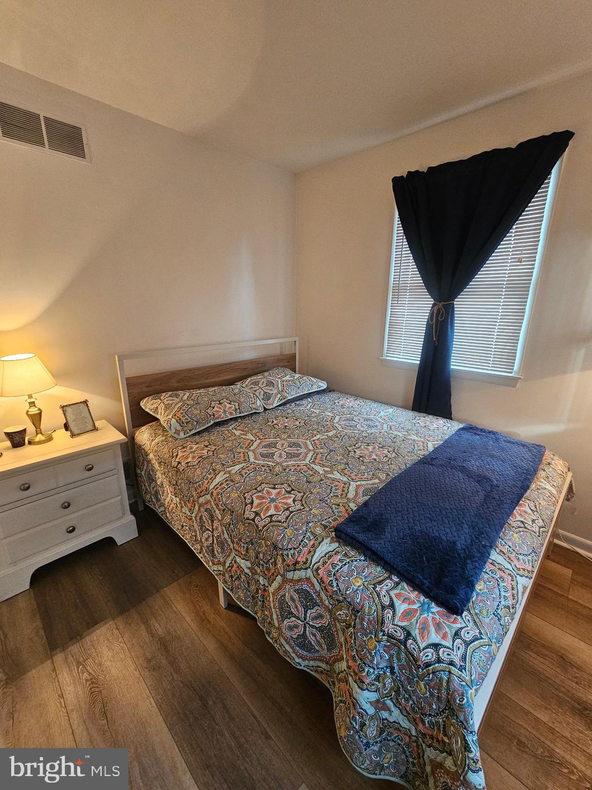 82 Basin Road Earleville, MD 21919 - Photo 36 of 46 a bedroom with a bed window and table