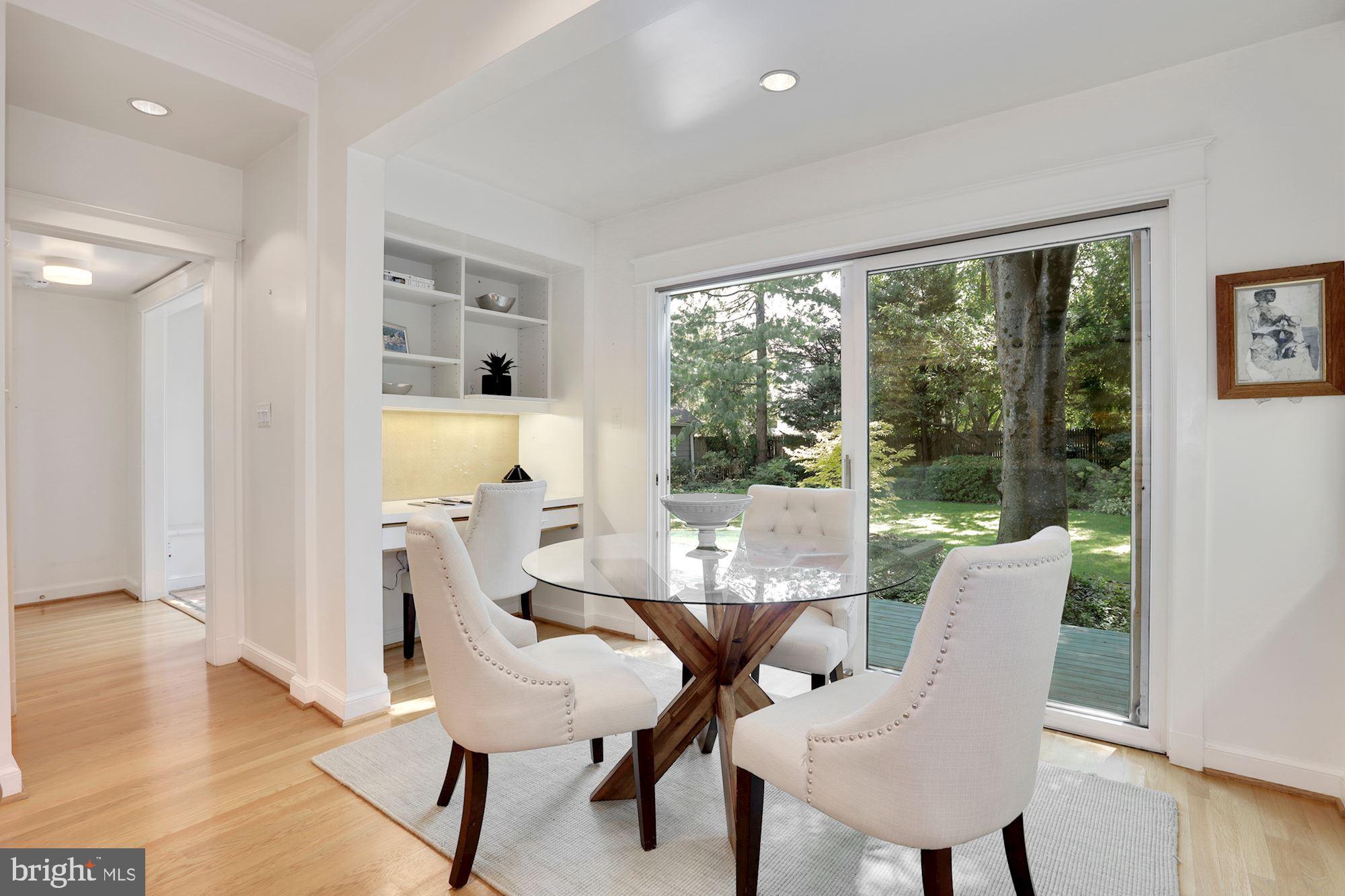 3720 Bradley Lane Chevy Chase, MD 20815 - Photo 11 of 29 a living room with furniture and a large window