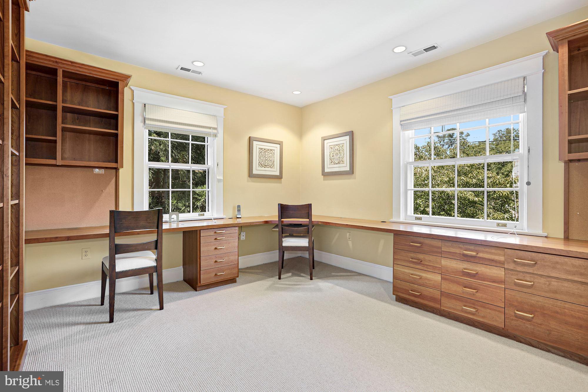 3720 Bradley Lane Chevy Chase, MD 20815 - Photo 23 of 29 a living room with furniture and windows