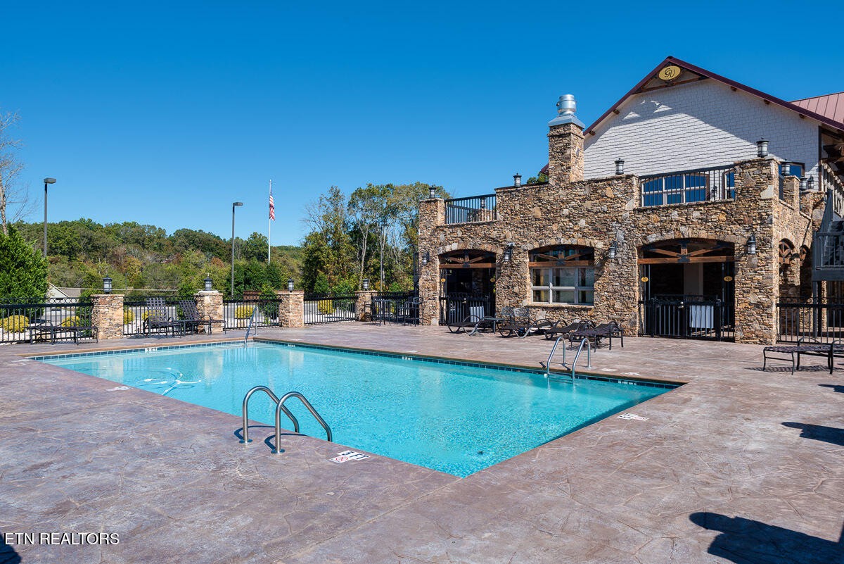 0 Ridge Top Drive Rockwood, TN 37854 - Photo 13 of 34 a view of a house with swimming pool and sitting area