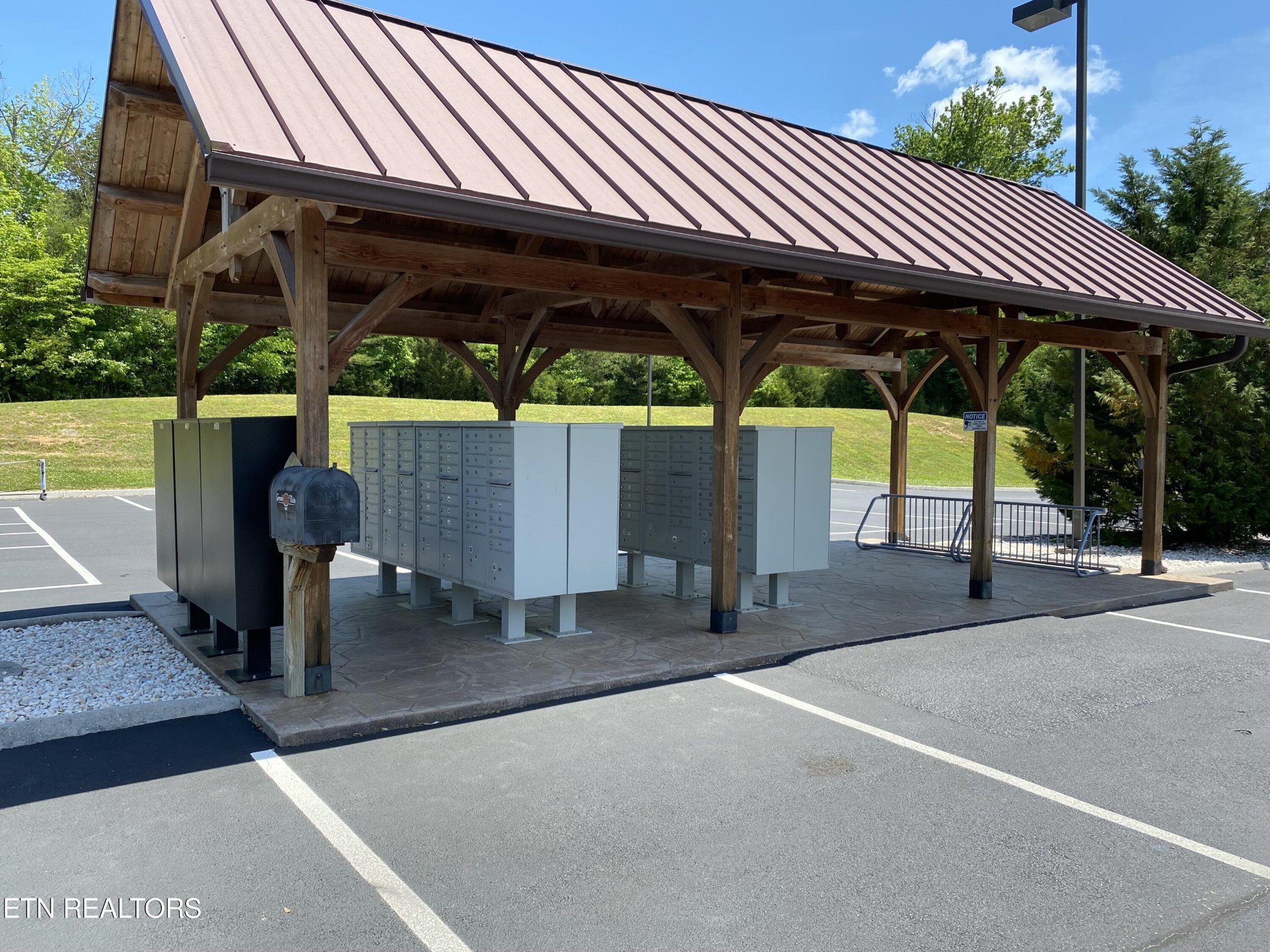 0 Ridge Top Drive Rockwood, TN 37854 - Photo 20 of 34 a patio with a table and chairs under an umbrella