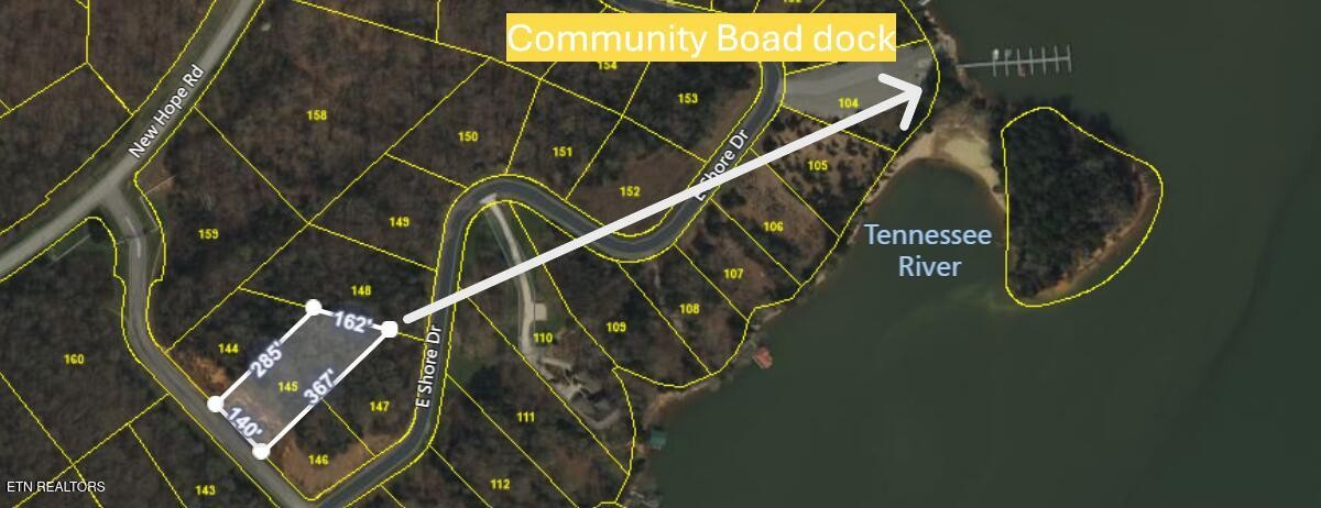 0 Ridge Top Drive Rockwood, TN 37854 - Photo 7 of 34 a utility room with water heater and wooden floor