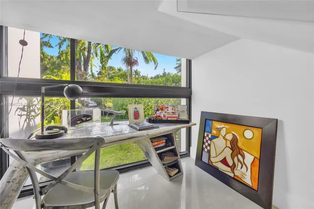 a dining room filled with furniture