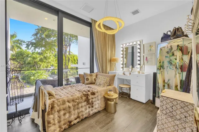 a bathroom with a toilet sink and shower