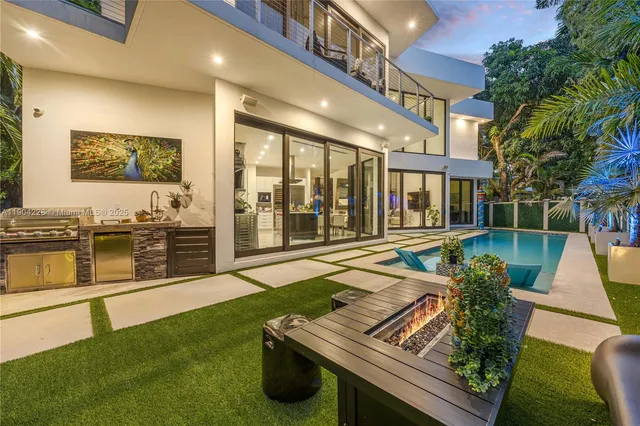 a view of a house with swimming pool