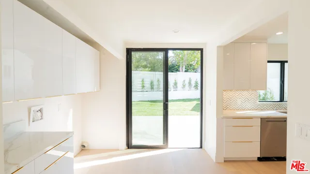 a room with a bed and a window