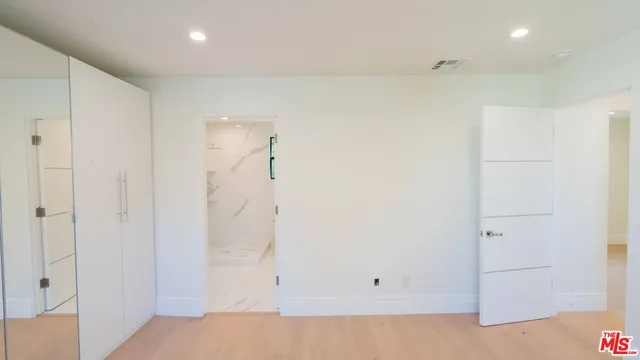 a bathroom with a bathtub and a sink