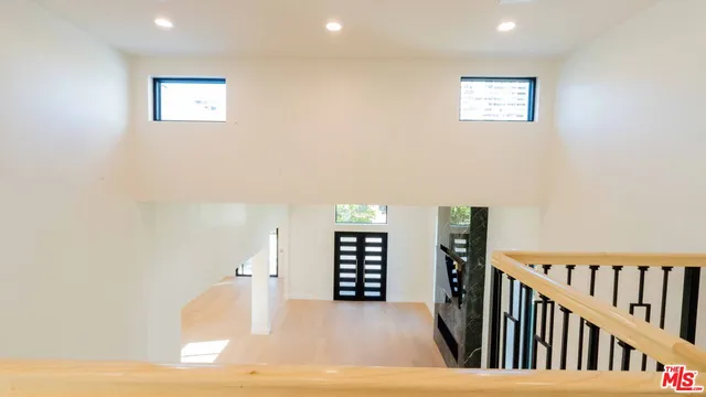 a view of swimming pool with patio