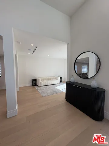 a room with furniture and a wooden floor