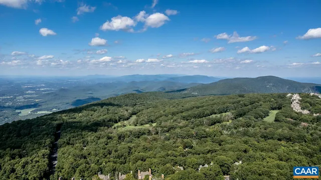 a view of a lake with mountains in the background