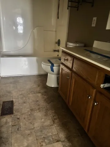 a bathroom with a sink and a toilet