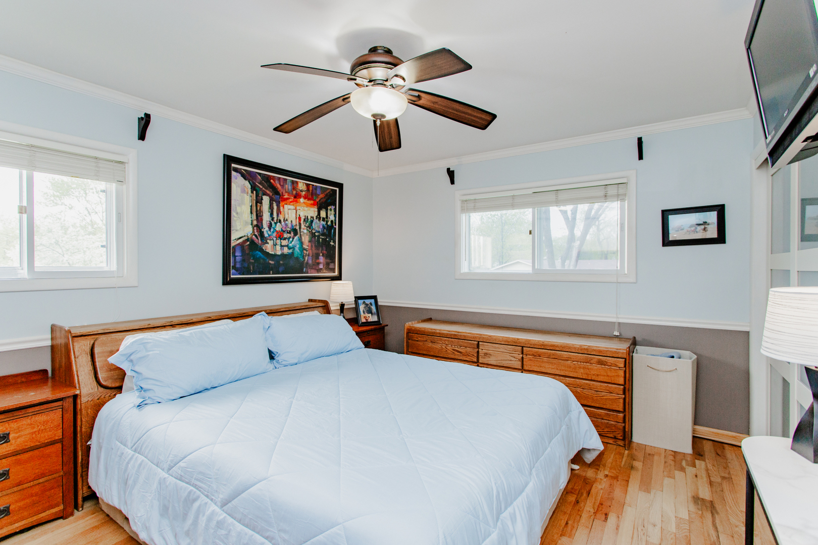 1685 Kent Road Hoffman Estates, IL 60169 - Photo 11 of 31 a bed room with a bed and a chandelier